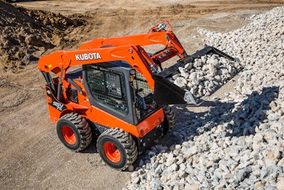 Kubota skid steer moving rocks