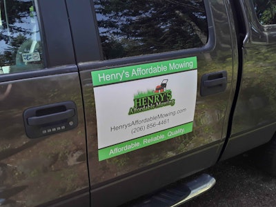 henry's affordable mowing advertised on the side of a truck