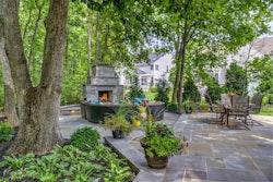 outdoor patio with firepit and seating area