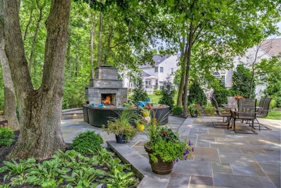 outdoor patio with firepit and seating area