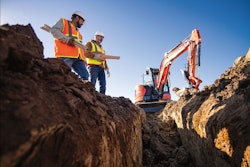 Kubota U48-5 excavator digging on jobsite