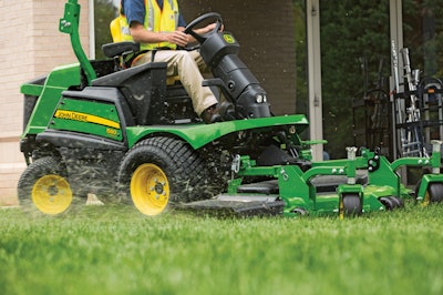 Man on john deere lawn mower