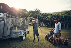 lawn care and landscaping professionals on the job