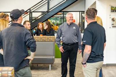 Oasis Turf & Tree owner Rob Reindl with employees