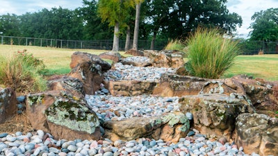 rock landscaping with ornamental grass