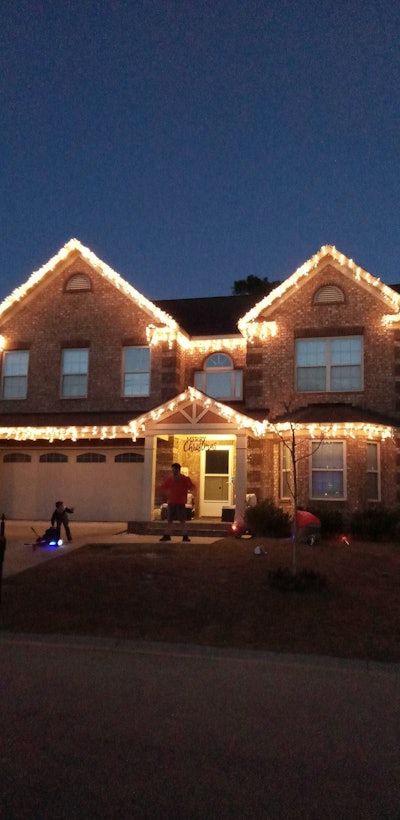 holiday lighting on front of house