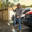 Plugging an E-Transit into a charging outlet