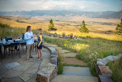 man and woman enjoying outdoor living area