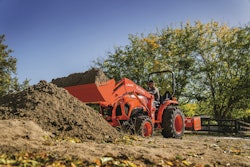 Kubuto L-Series Tractor with bucket full of dirt.
