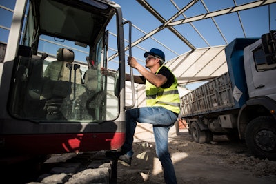 Operators getting into machine