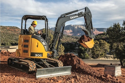 John Deere’s 30G compact excavator digging a foundation