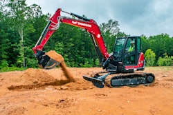 Yanmar SV100-2A mini excavator scooping dirt