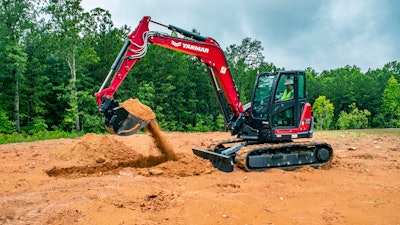 Yanmar SV100-2A mini excavator scooping dirt