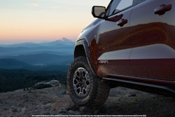 GMC Canyon AT4X sneak peak of driver side doors front wheel