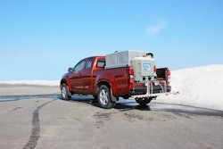 Hilltip SprayStriker 2600 attached to a red truck