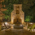 Outdoor fireplace and patio area