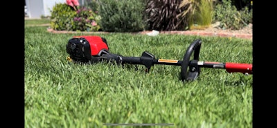 string trimmer with Momentum IoT's Toolie attached
