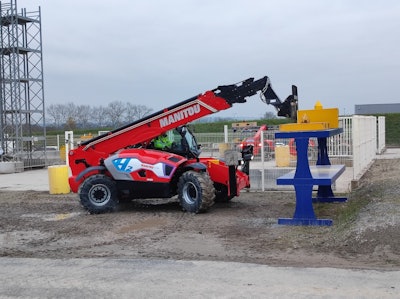 Manitou hydrogen telehandler prototype with fork attachment