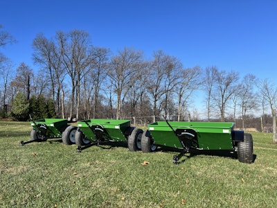 Three Earth & Turf drop spreaders