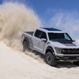 A stock 2023 Ford F-150 Raptor R in avalanche gray.