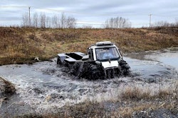 Fat Truck 8x8 amphibious vehicle crossing a river