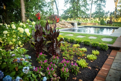 Water feature with landscaping and landscaping