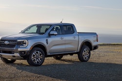 silver 2024 Ford Ranger Lariat on hilltop gravel road