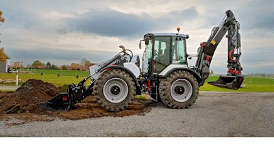 Huddig 1370T hybrid backhoe digging with front loader bucket