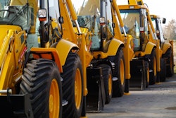 line of heavy equipment