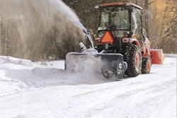 tractor blowing snow with IronCraft snow cannon