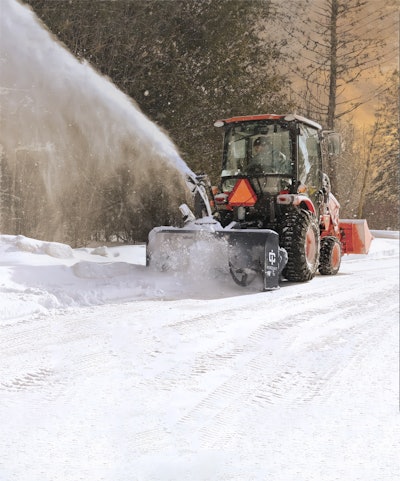 tractor blowing snow with IronCraft snow cannon