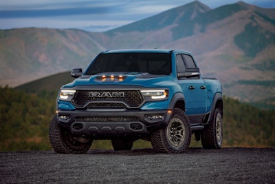blue 2024 ram 1500 trx final edition parked mountain background