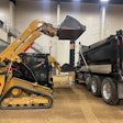 Cat 255 and 265 Compact Track Loaders loading dump truck