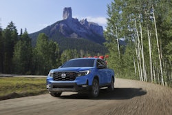 light blue 2024 Honda Ridgeline TrailSport mountains in background