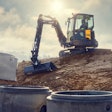 Volvo ECR40 compact excavator on dirt hill