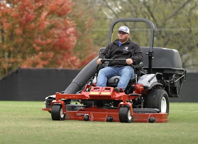 Eric Varner of Varner's Lawn Service mowing one of the many sports fields his company is contracted to maintain.