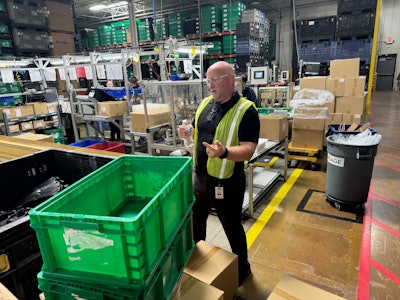 ECHO's Ryan Ladley takes members of the media on a factory tour.