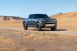 bluish gray Scout Terra pickup truck front sideview in desert