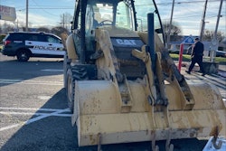 Cat backhoe in parking lot used to steal ATM in Puyallup Washington