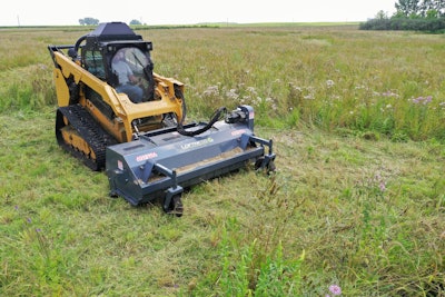 Loftness flail mower attachment on a compact track loader