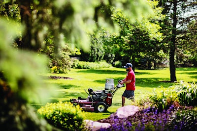 man mowing