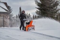 snowblower throwing snow