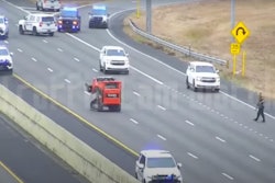 traffic camera video stolen Kubota compact track loader headed toward Mobile police vehicles on I-10