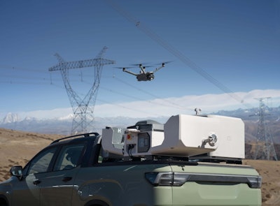a drone approaches a truck mounted dock