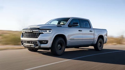 2026 1500 Ramcharger pickup truck silver driving on road