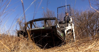 Diamond Mowers Mini Brush Cutter Pro X on a stand-on track loader