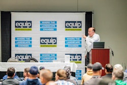 man at podium during education session