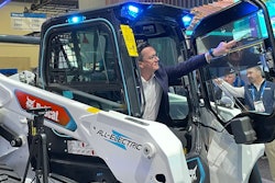 A look at Bobcat's CES booth in 2024, featuring a concept transparent Organic Light Emitting Diode touch display on a S7X electric skid steer loader.