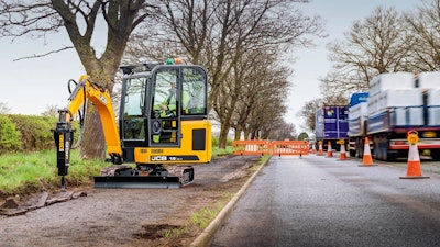 JCB offers two versions of its popular 1.8-metric-ton model — the diesel 19C-1 (above) and the electric 19C-1E. Both are conventional tail swing with 8 feet 5 inches of maximum dig depth and 8 feet 7 inches of maximum dump height.