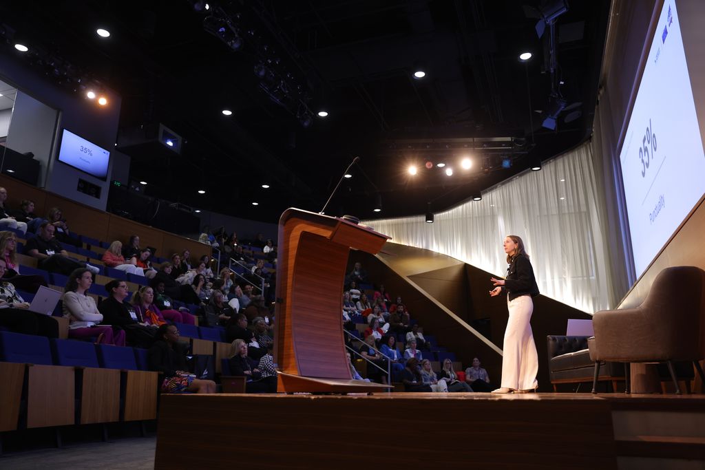 Kamber Parker Bowden speaks to a crowd about the advantages of embracing a multi-generational work environment.